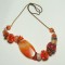 Tumbling Beads Necklace in Amber